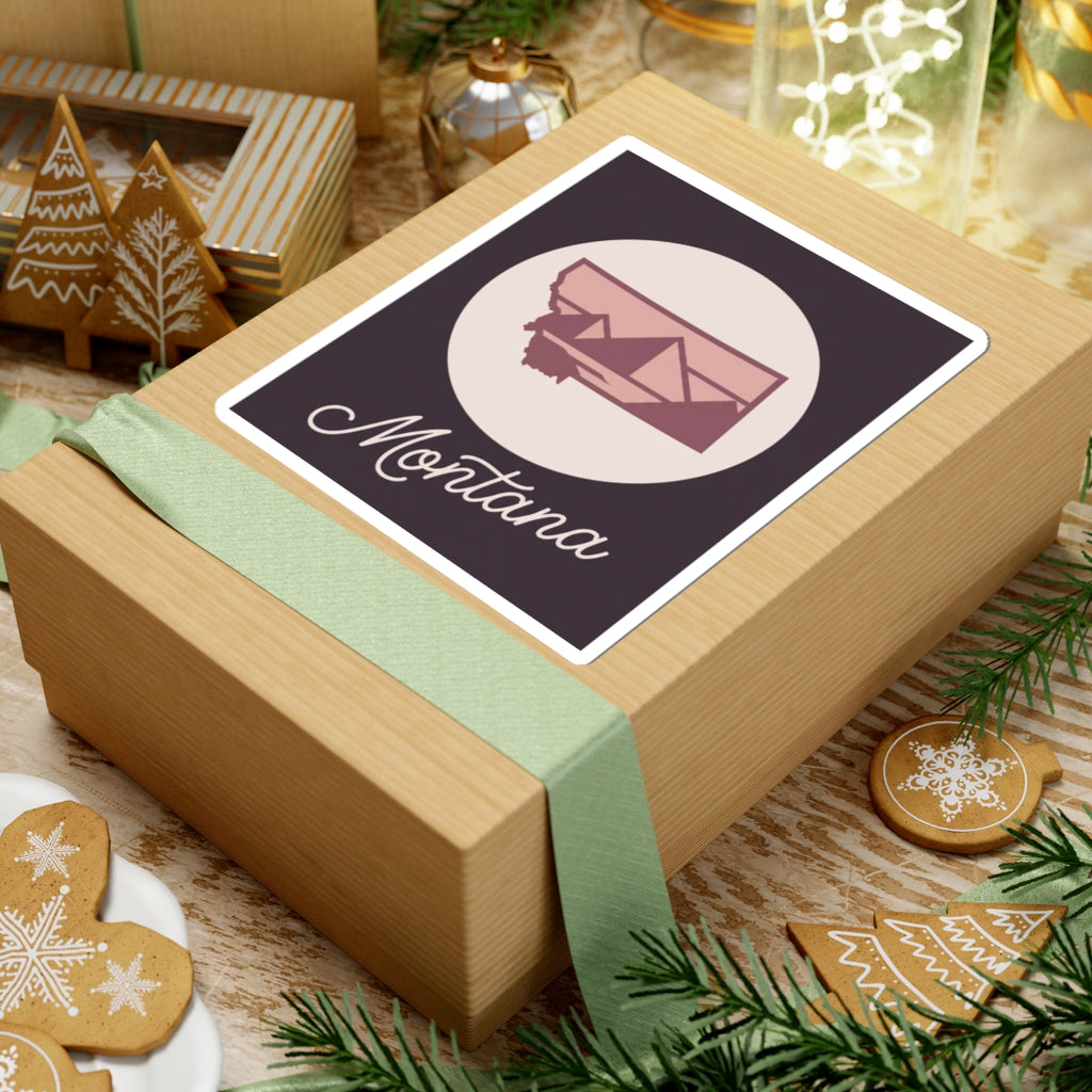Montana travel sticker decal on gift lid with circular mountain graphic and “Montana”