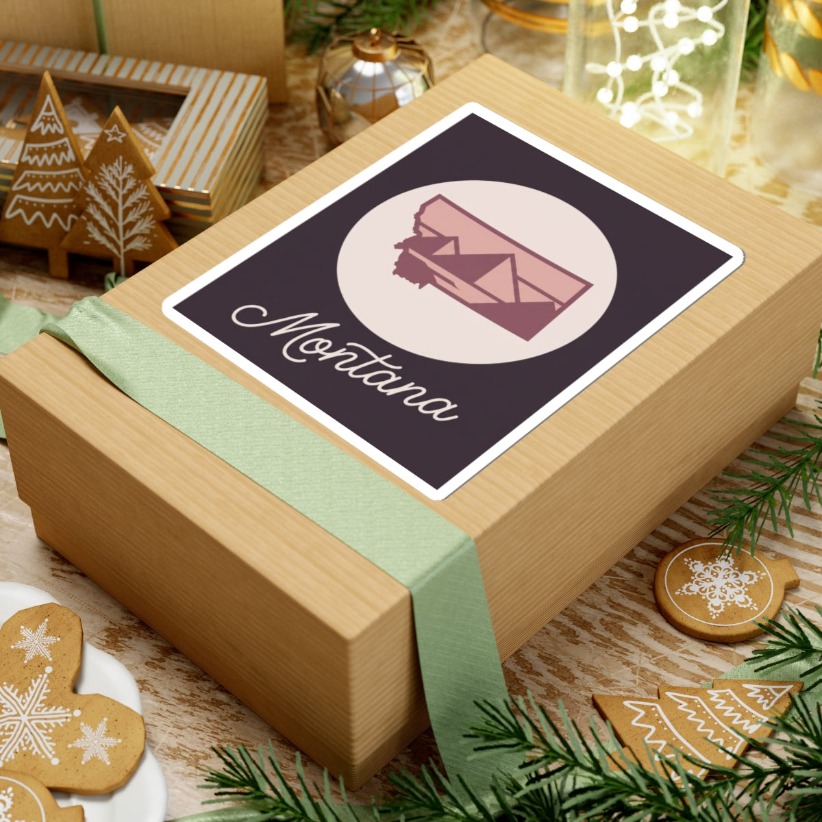 Montana travel sticker decal on gift lid with circular mountain graphic and “Montana”