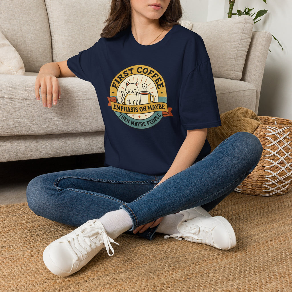 Navy T-shirt with cat coffee emblem on chest, worn by model