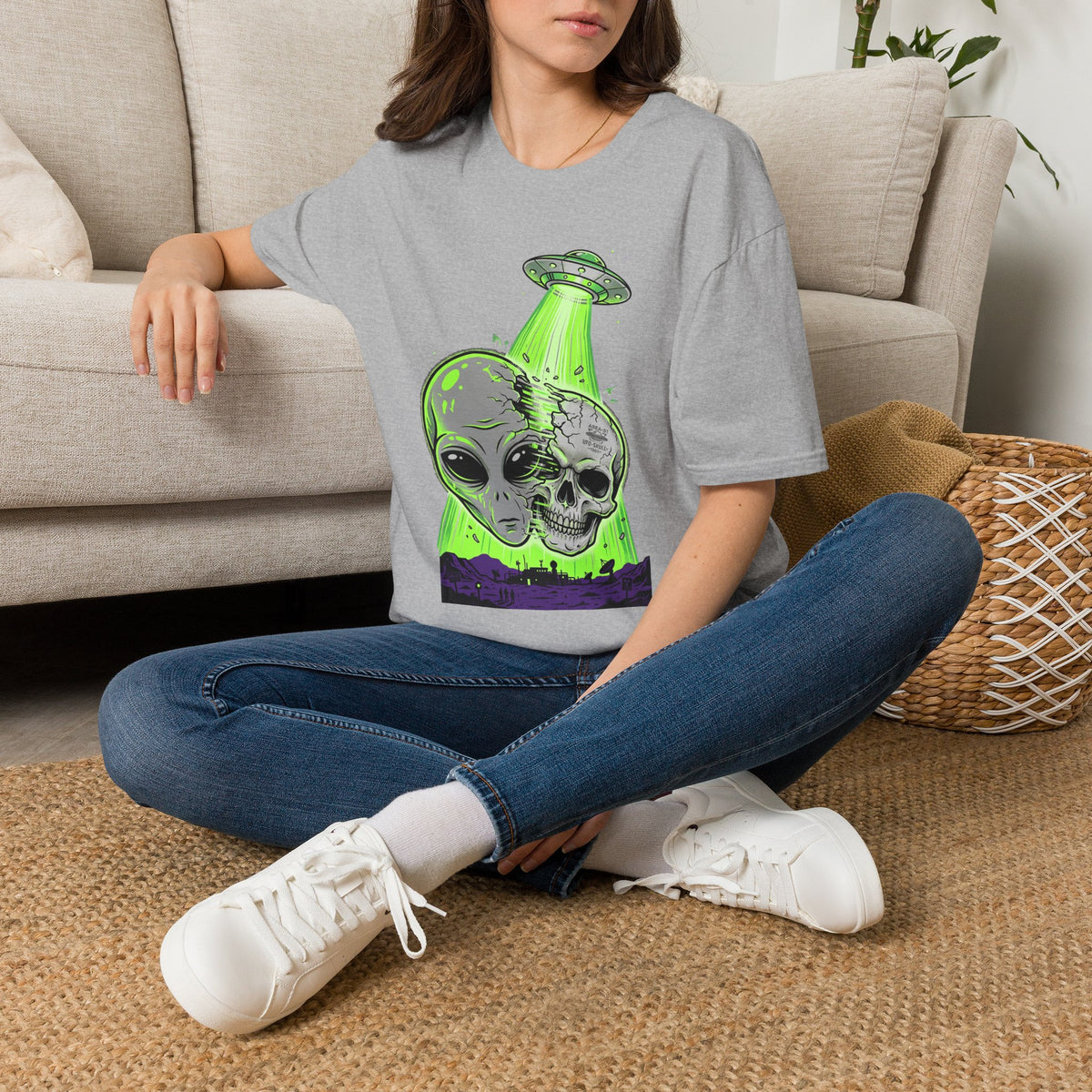 Sport gray t-shirt with green alien skull and UFO graphic, model wearing