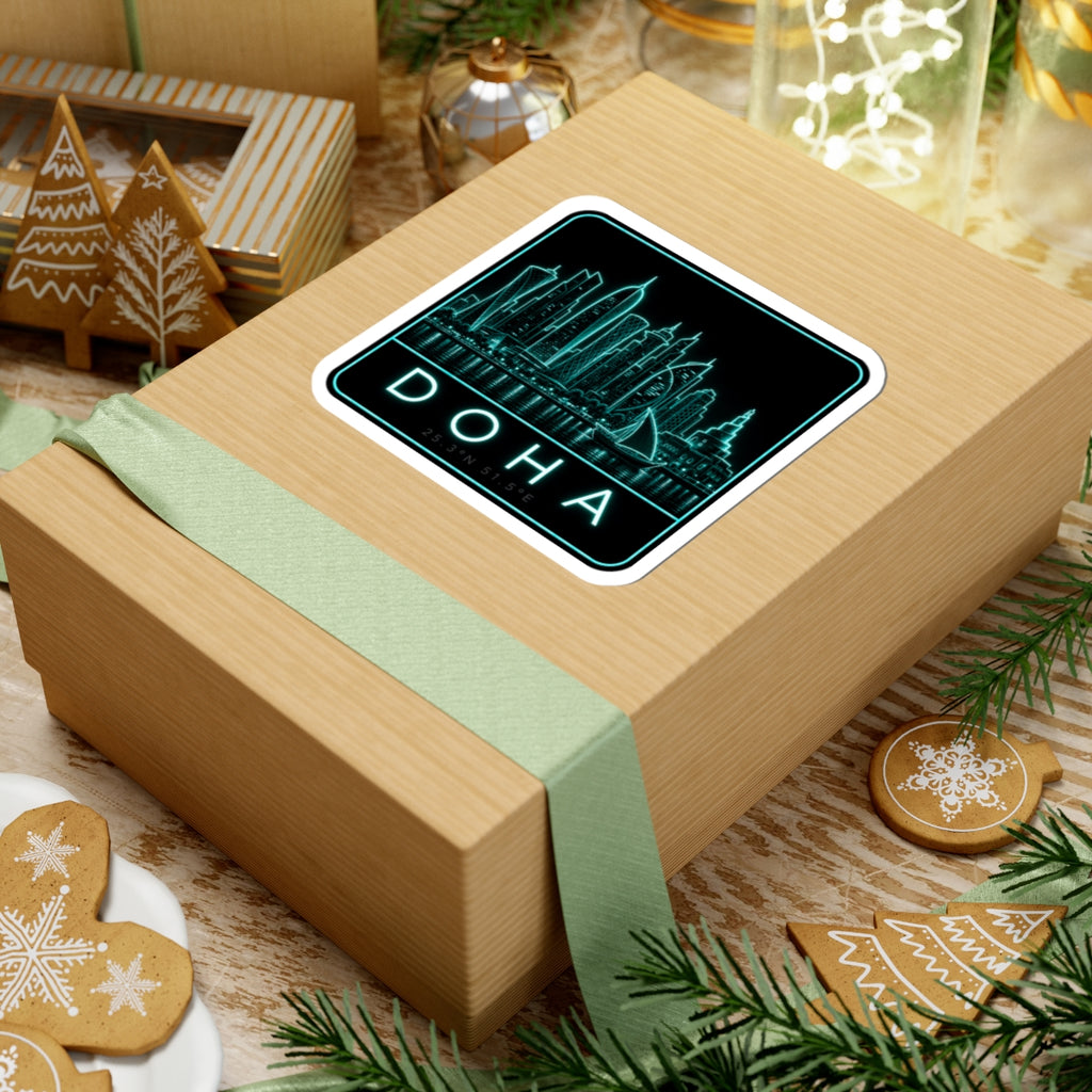 Neon Doha skyline sticker on wrapped box, teal buildings and DOHA text with border