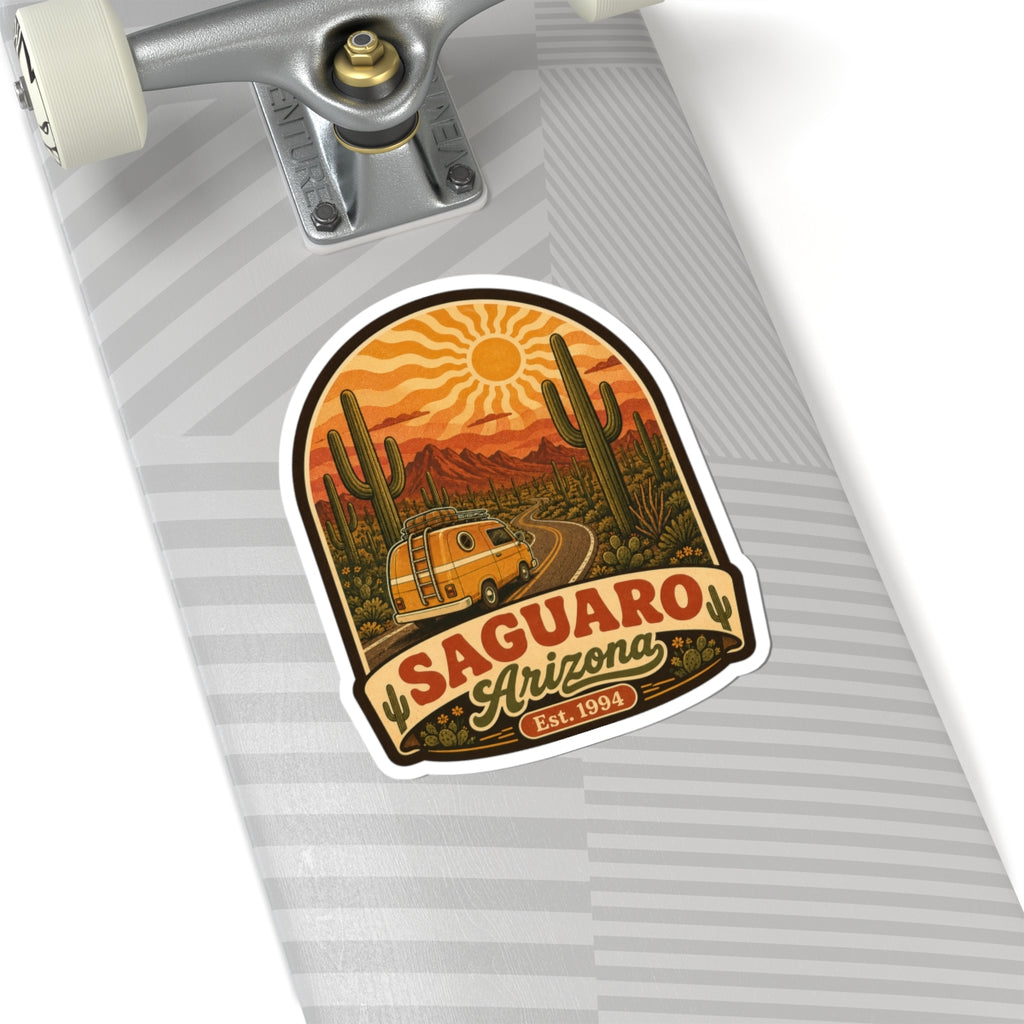 Saguaro Arizona sticker close-up on gray surface: yellow van, cacti, sun, Est. 1994