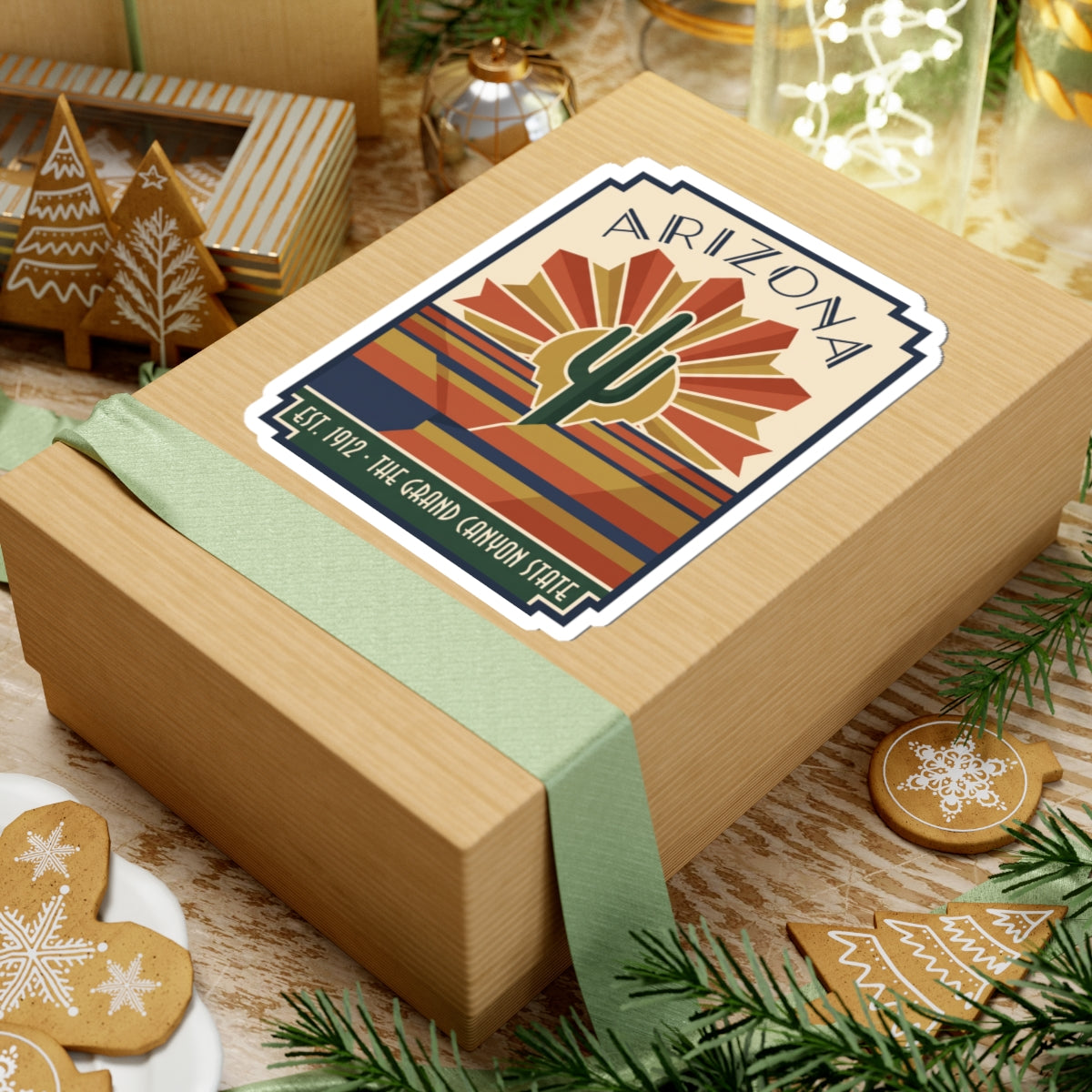 Arizona cactus sticker on wrapped gift, with art deco rays, desert bands, and “Arizona” text