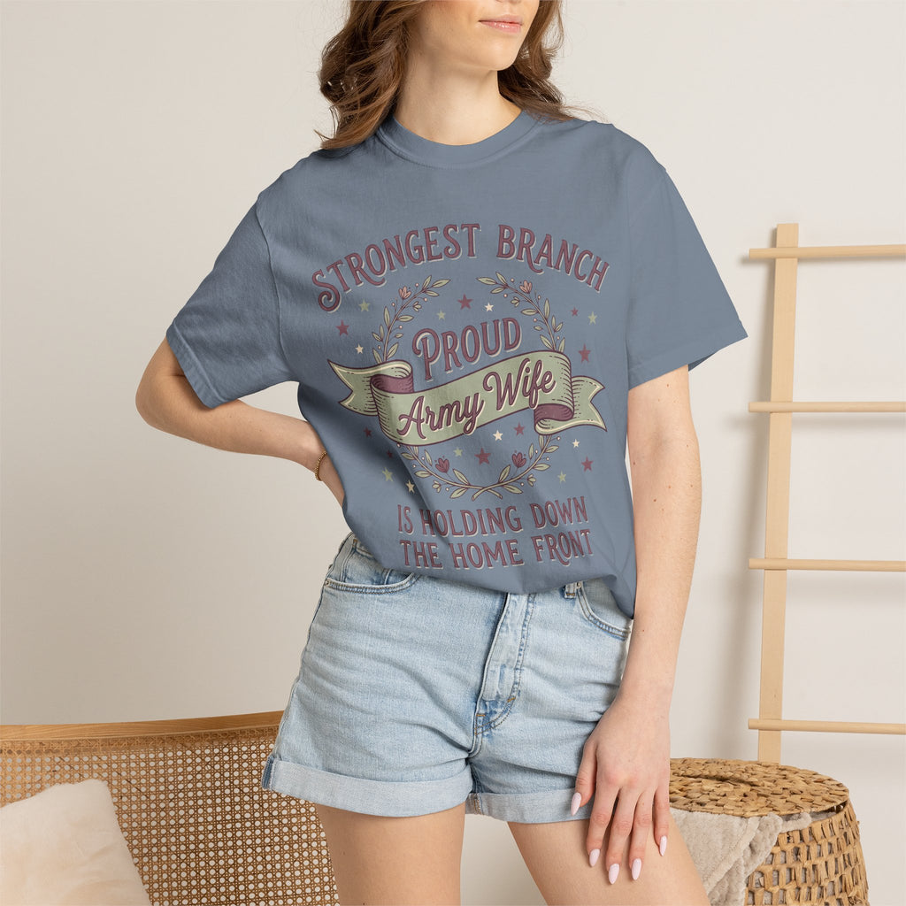 Blue T-shirt worn by a person, featuring “Proud Army Wife” patriotic text graphic