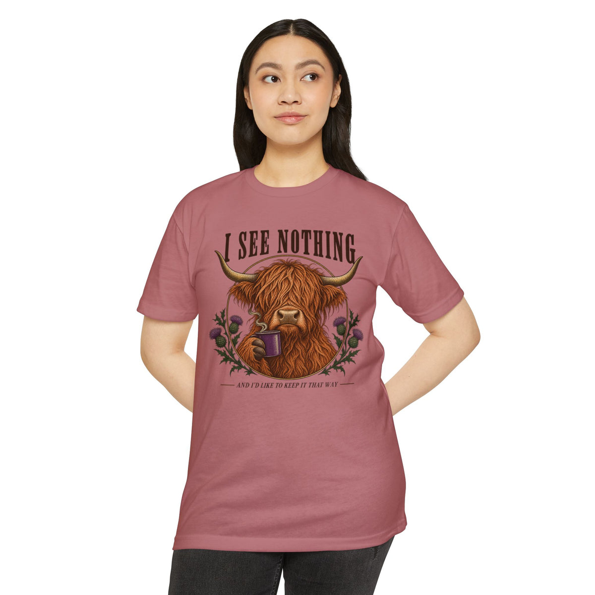Rose pink short-sleeve T-shirt with Highland cow graphic and “I see nothing” text