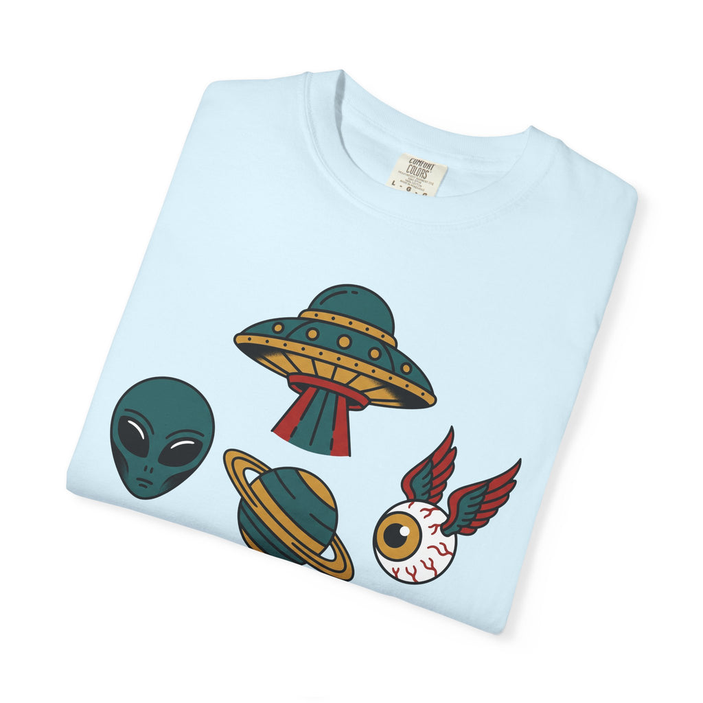 Light blue crewneck T-shirt with alien UFO patchwork graphic on front.