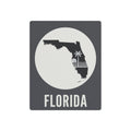 Florida state silhouette metal wall art with palm tree motif and word “FLORIDA”