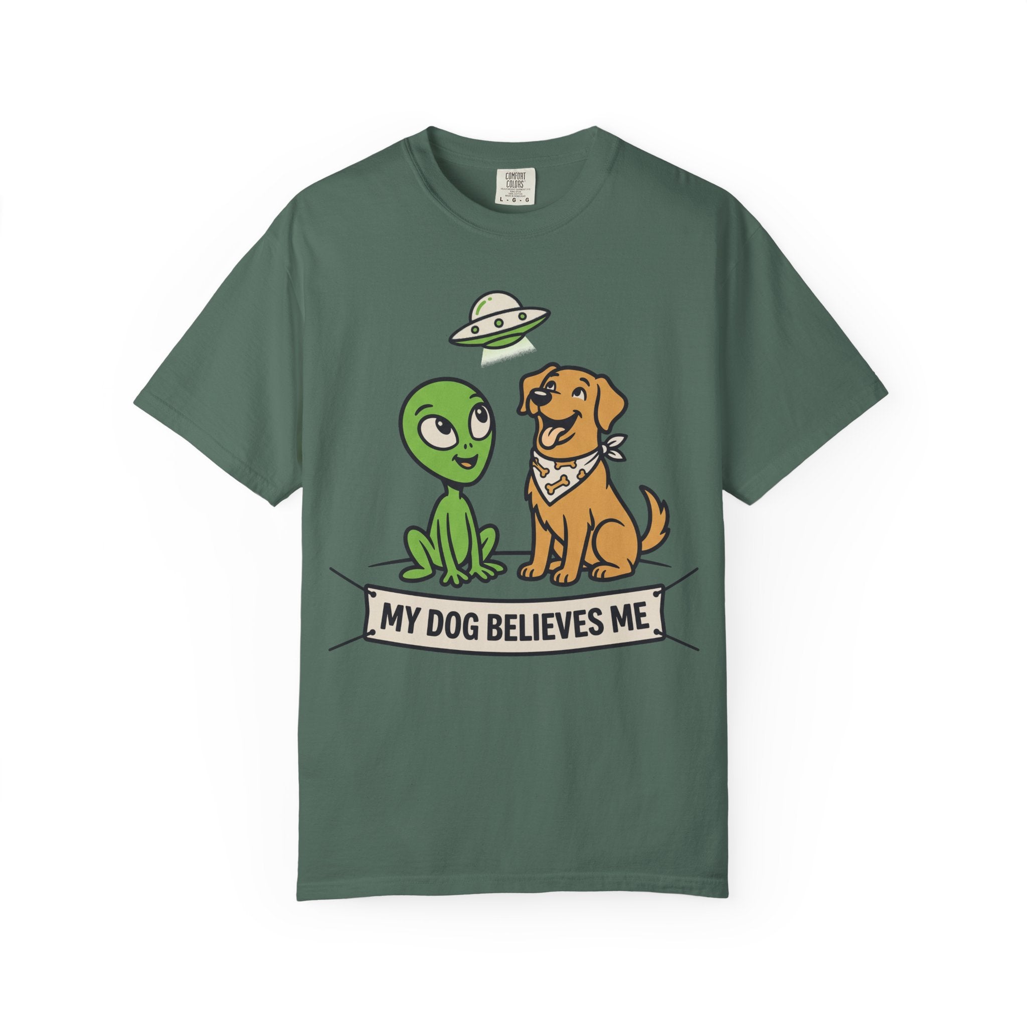 Dark green t-shirt with cartoon alien, dog, and "My Dog Believes Me" graphic