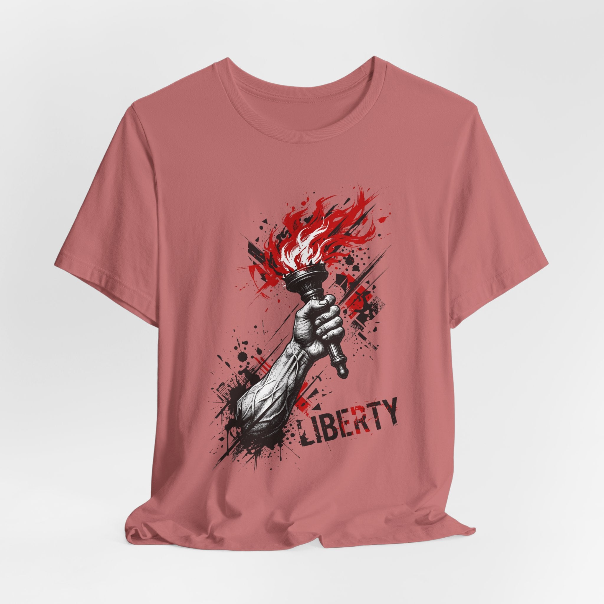 Rose-pink crewneck T-shirt with Liberty word and red flame torch graphic.
