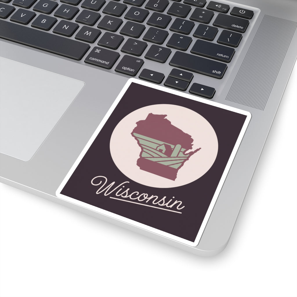 Wisconsin kiss-cut sticker on laptop: maroon state silhouette and cursive “Wisconsin”
