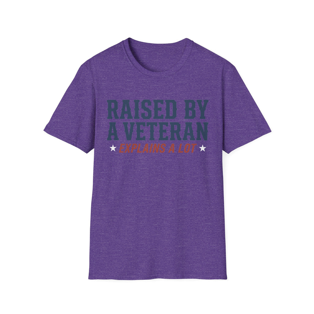 Heather purple crewneck T-shirt with 'RAISED BY A VETERAN' and 'EXPLAINS A LOT' graphic