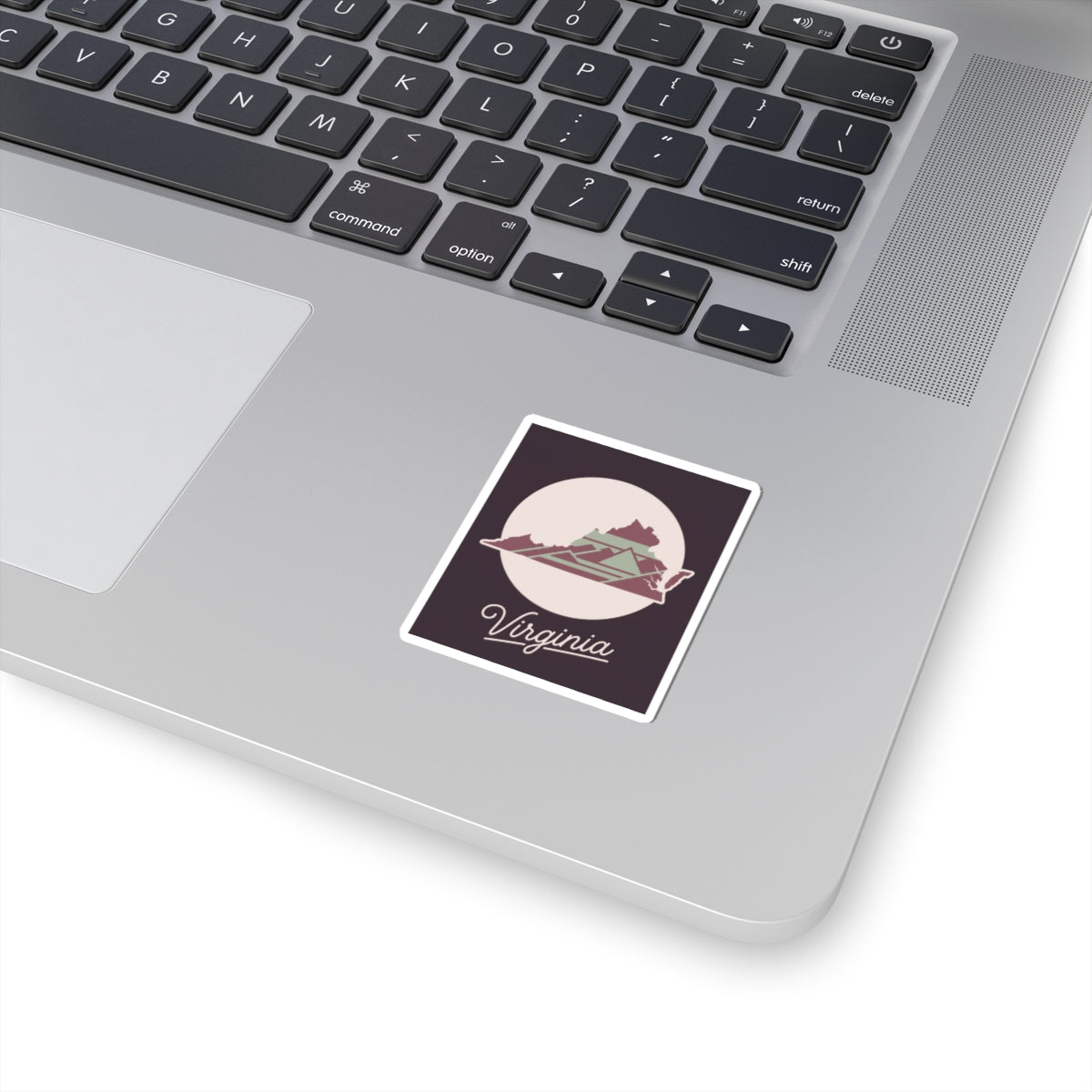 Virginia state silhouette kiss-cut decal on dark square, laptop surface