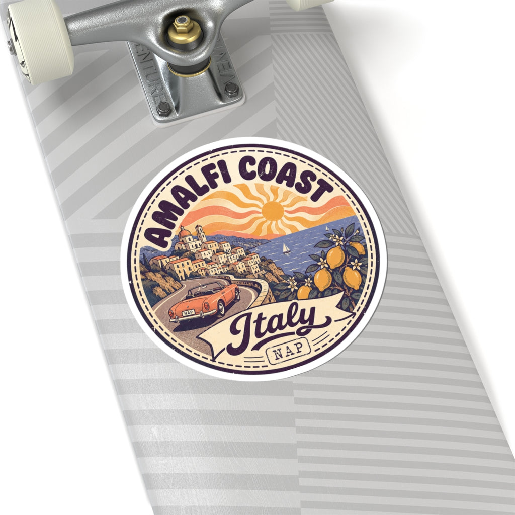 Circular Amalfi Coast Italy sticker on a skateboard, with sun, lemons, and “Italy” banner
