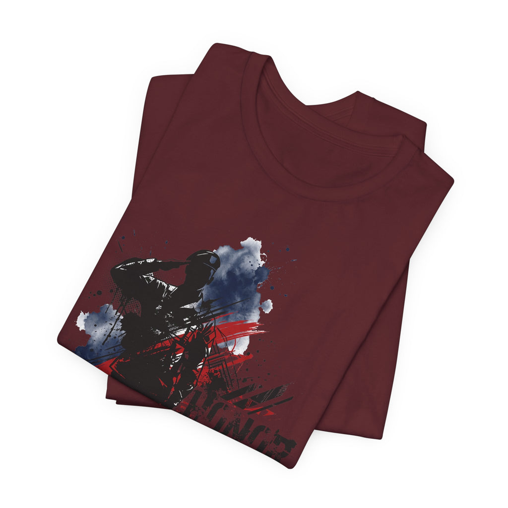 Maroon T-shirt with front printed soldier silhouette graphic in black, red, and blue