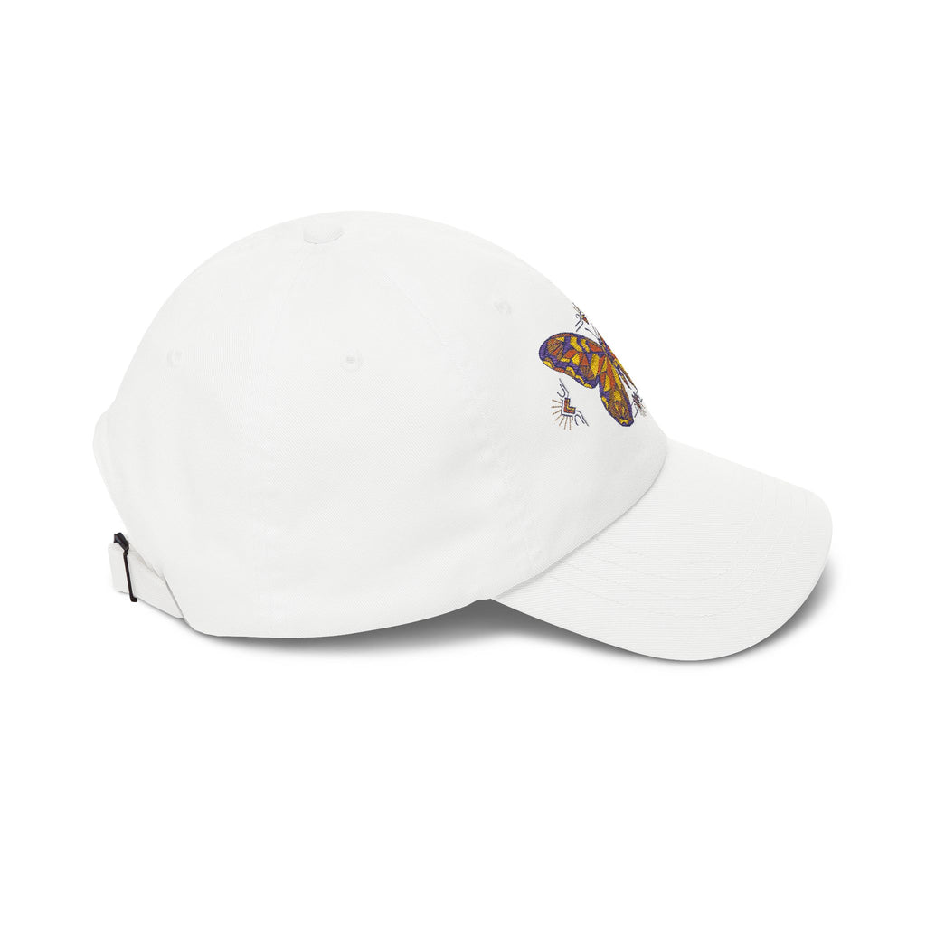 Embroidered dad cap in white with colorful moth embroidery near the front seam