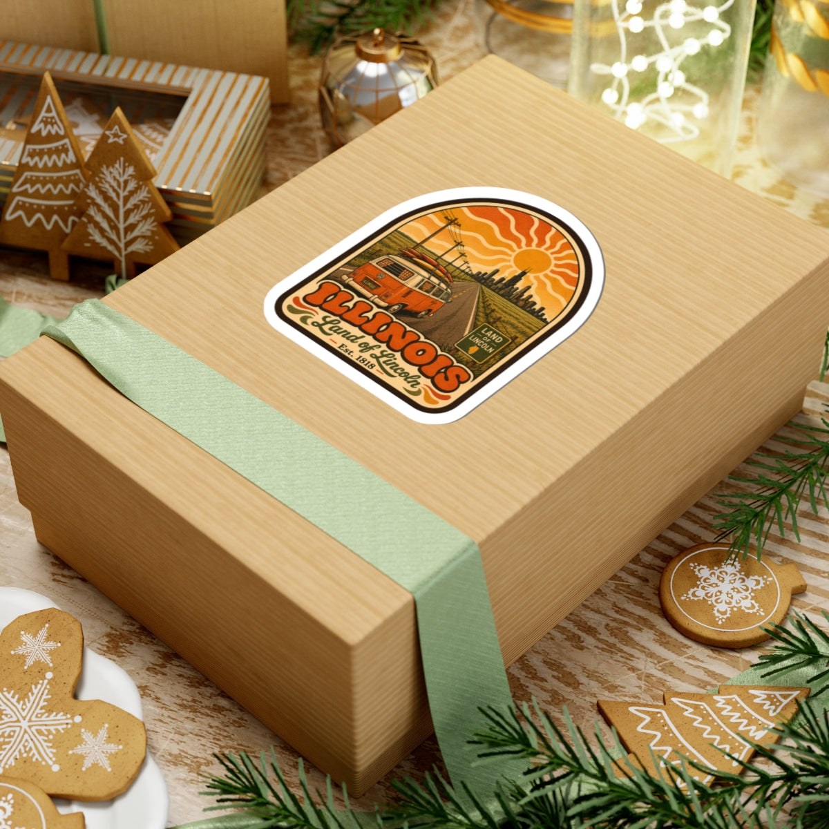 Kiss-cut sticker on wrapped gift: orange camper van, Illinois lettering, Land of Lincoln, Est. 1818