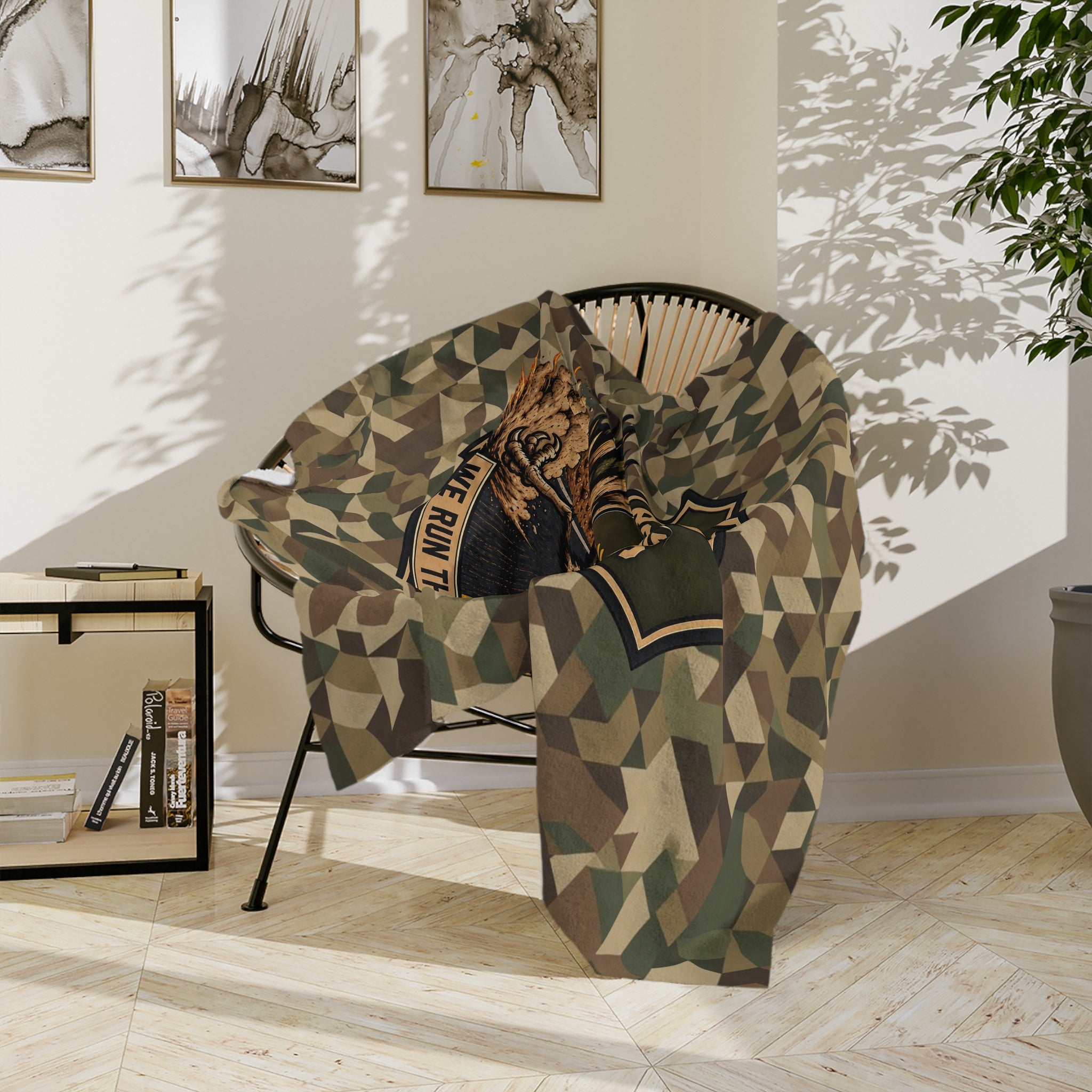 Camo microfiber blanket draped on chair with eagle emblem patch and “226 HHD” badge