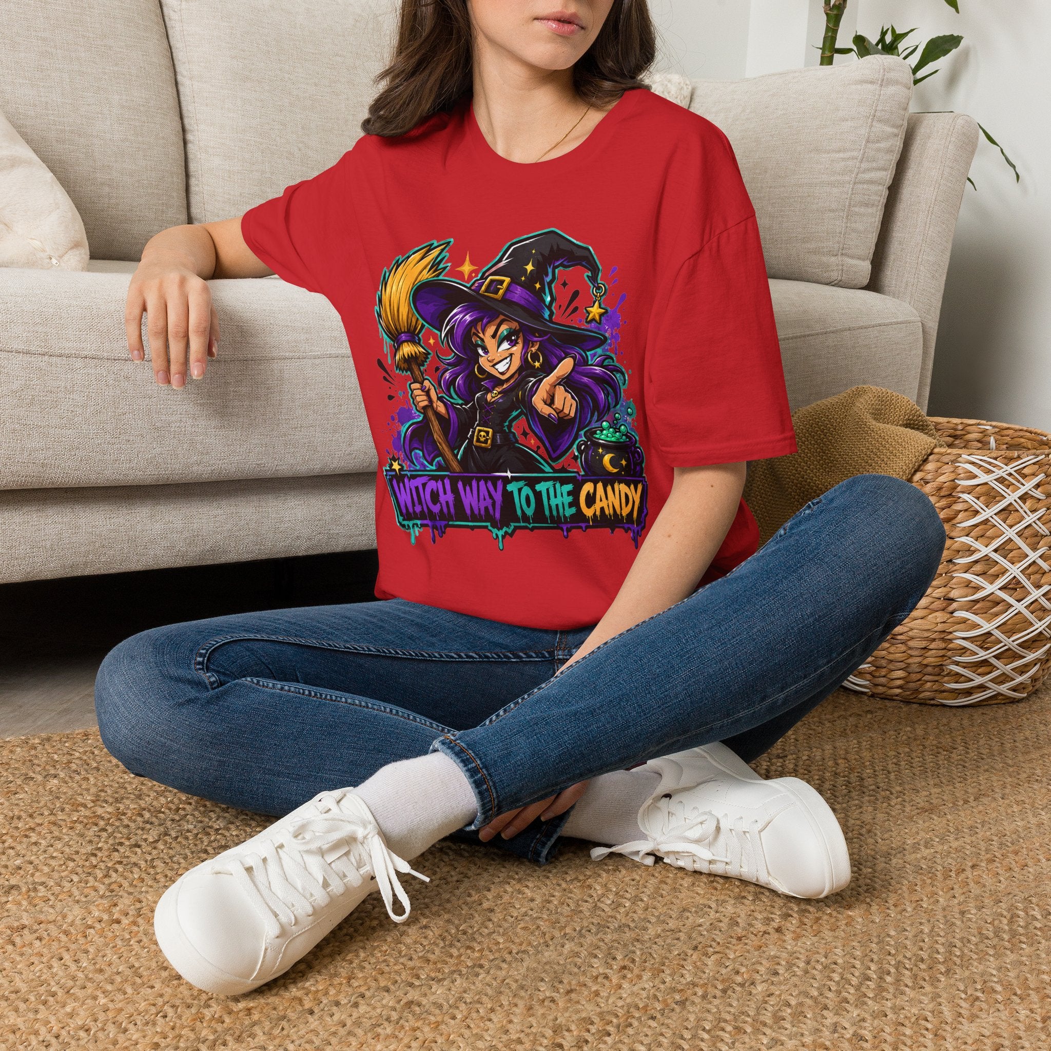 Red T-shirt worn by model, witch graphic and slogan across chest