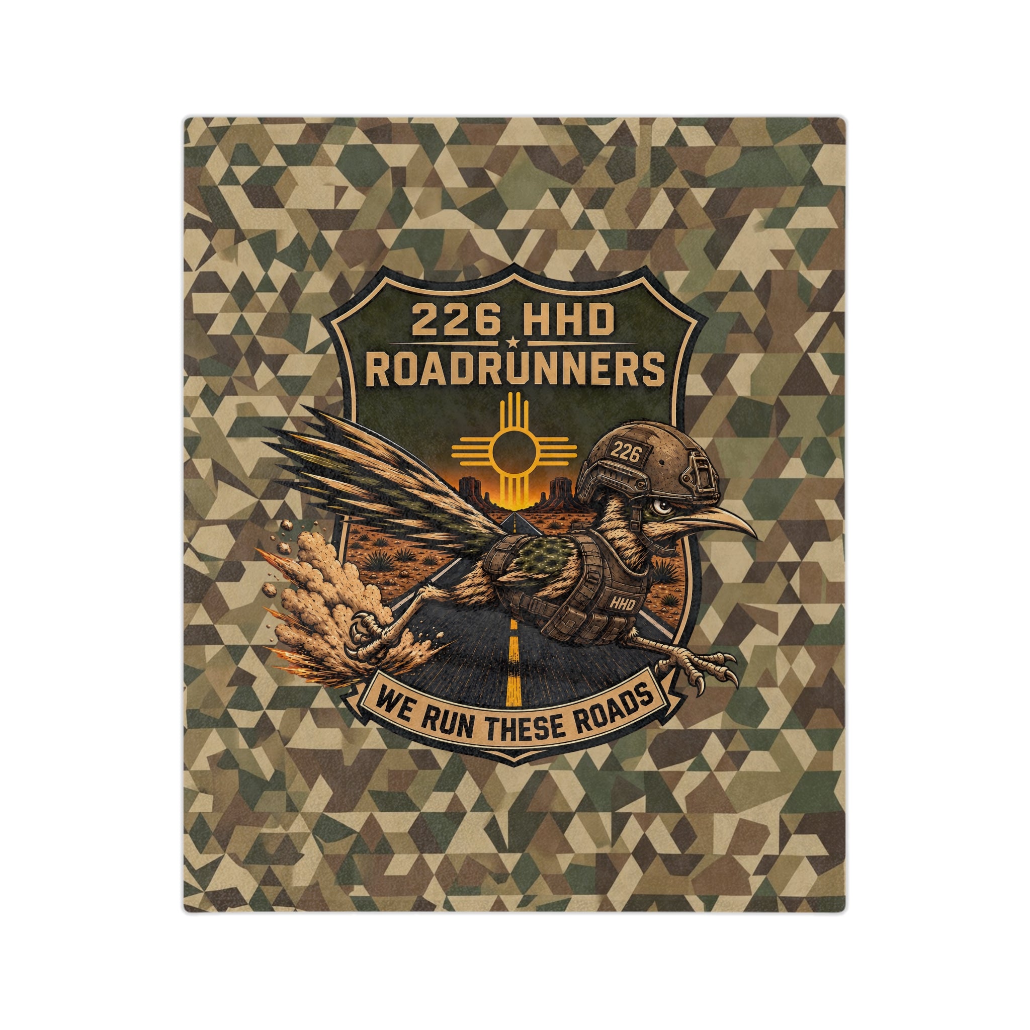 Camo microfiber blanket showing central round Roadrunners patch with eagle and banner