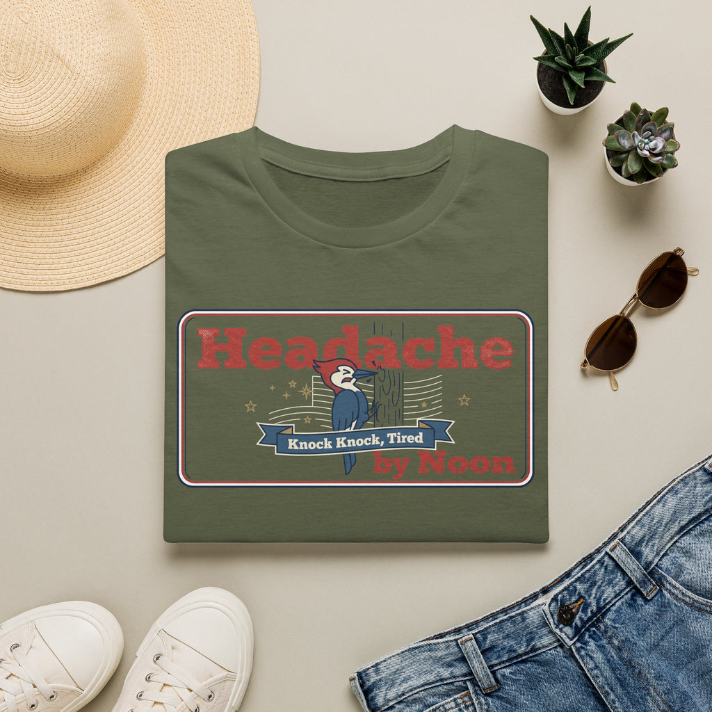 Military green T-shirt with “Headache” graphic and banner text in red and blue