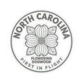 Round North Carolina dogwood state flower sticker with gray floral seal on clear vinyl