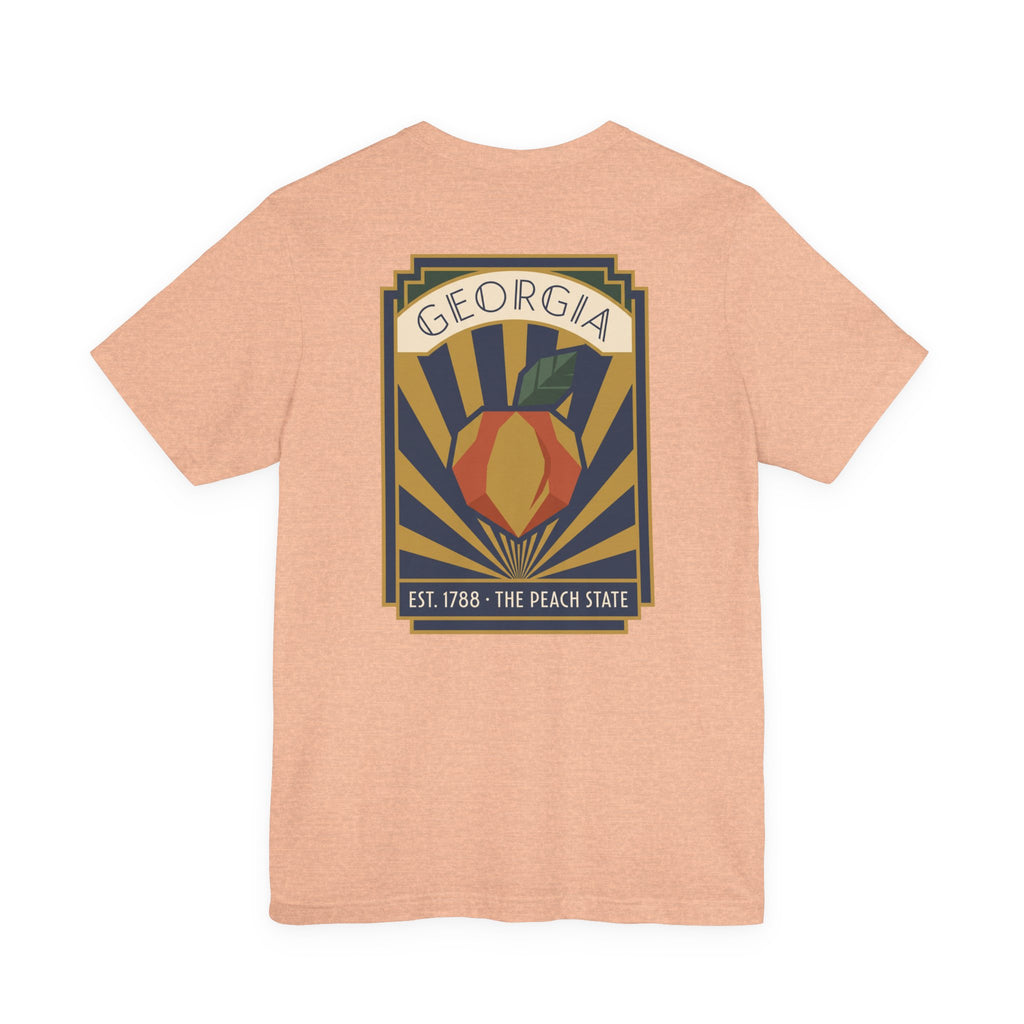Peach-state graphic t-shirt in peach pink with centered Georgia emblem poster print
