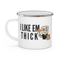 White ceramic mug with 'I LIKE EM THICK' text and cartoon pancake character
