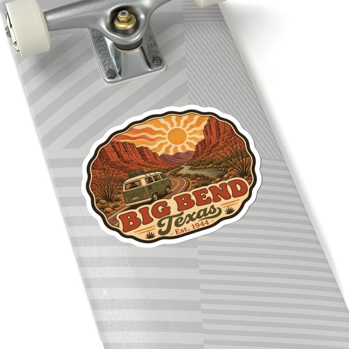 Die-cut road trip sticker on an envelope with Big Bend Texas desert landscape and vintage camper