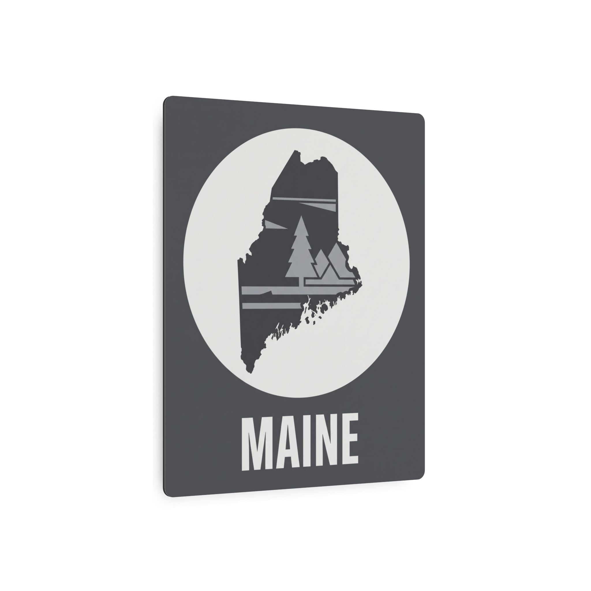 Maine metal art sign: dark gray panel with white circle, pine tree silhouette, MAINE word