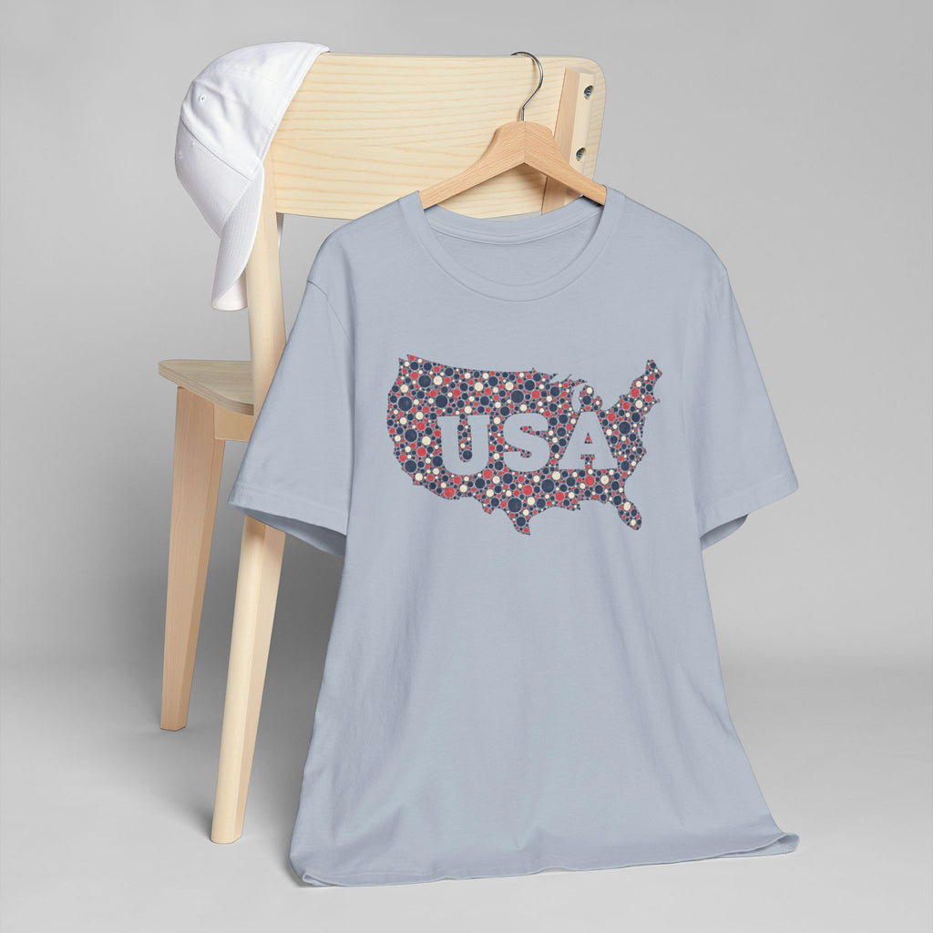Light blue T-shirt with colorful USA map graphic in red, blue, and white dots