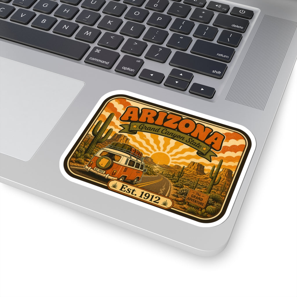 Die-cut sticker featuring Arizona text over desert art with vintage camper and Est. 1912