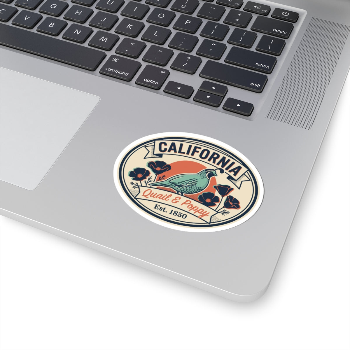 California oval quail and poppy sticker on a laptop palm rest