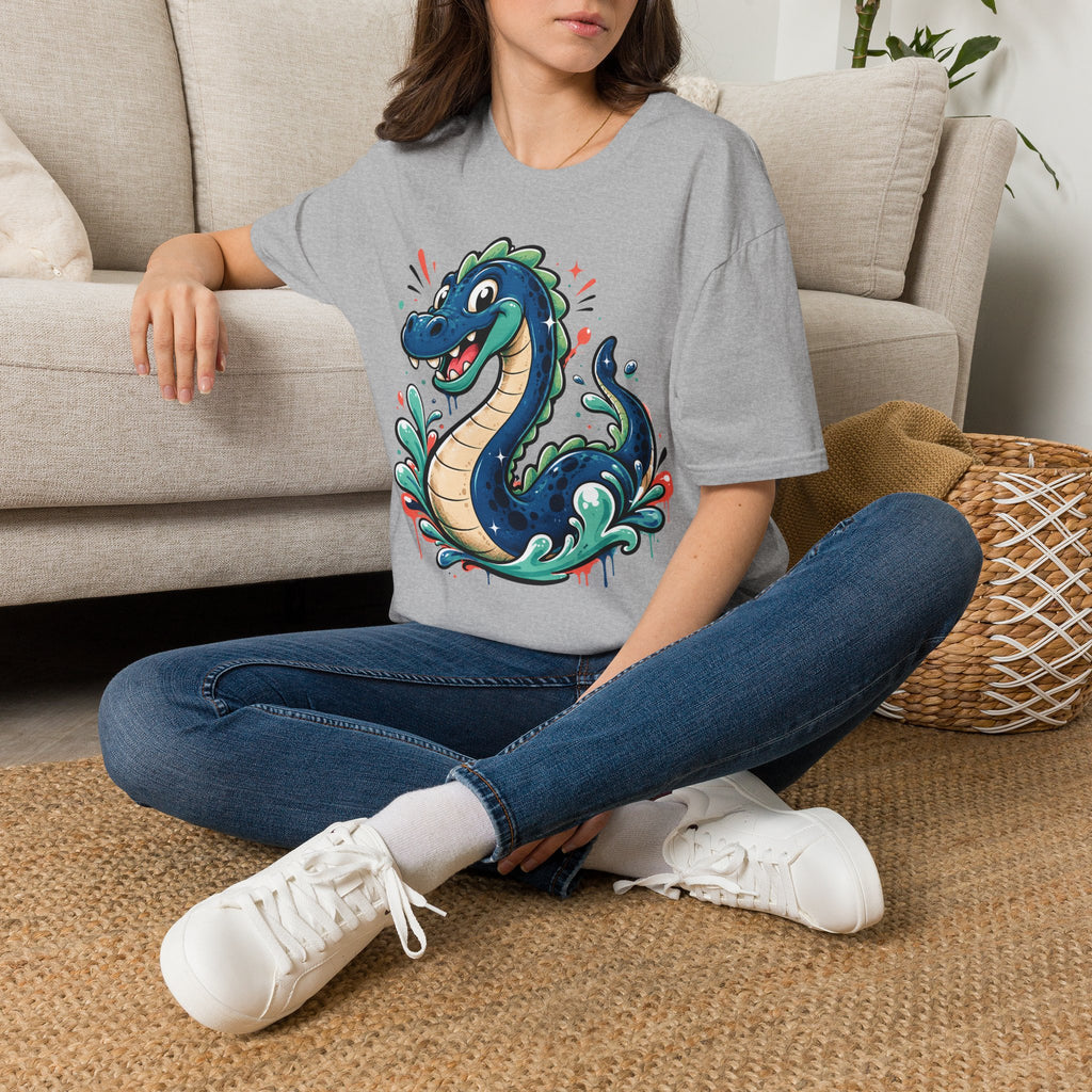 Light gray sea serpent graphic T-shirt with smiling cartoon lake monster front print