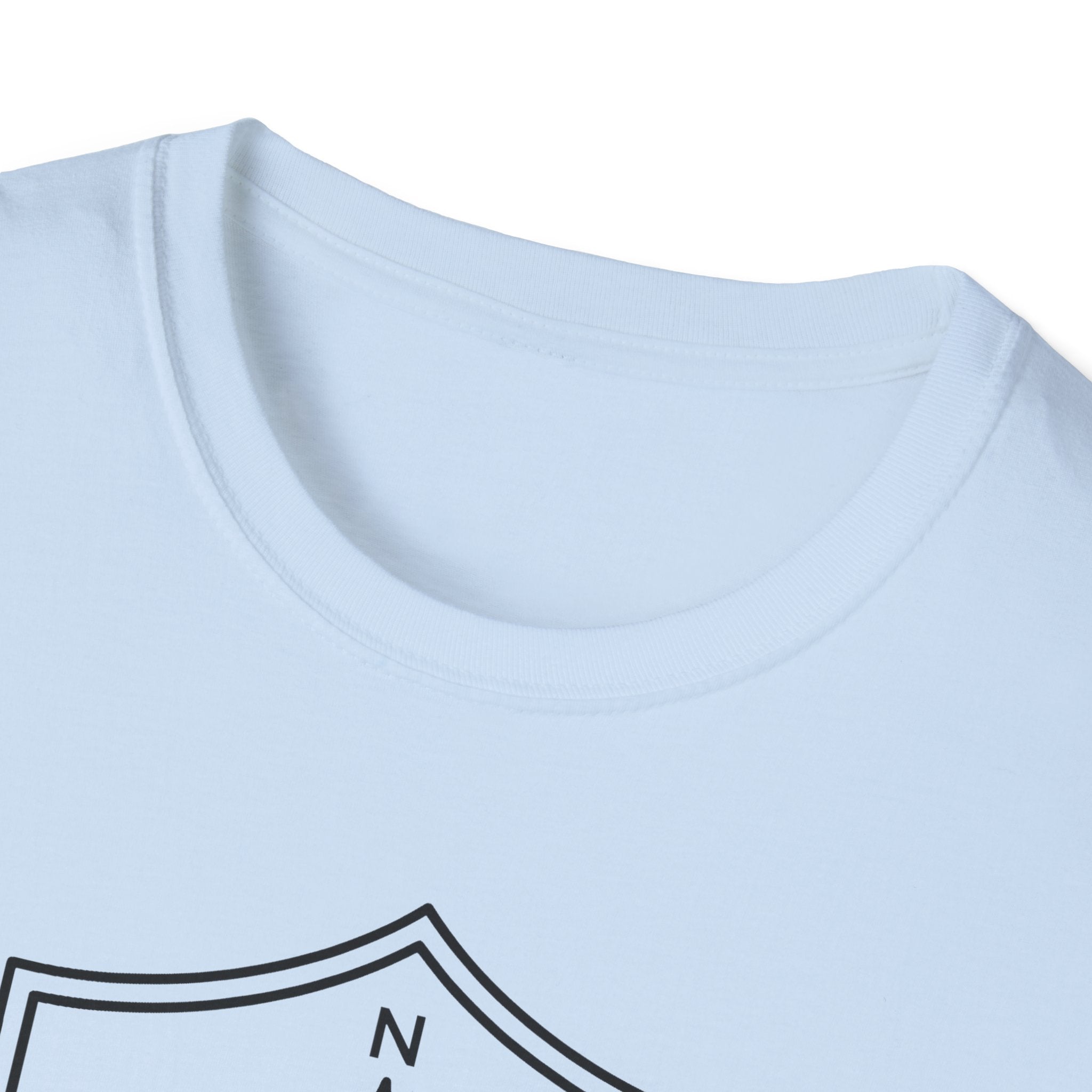 Light blue compass shield T-shirt with crew neckline and partial shield graphic near chest
