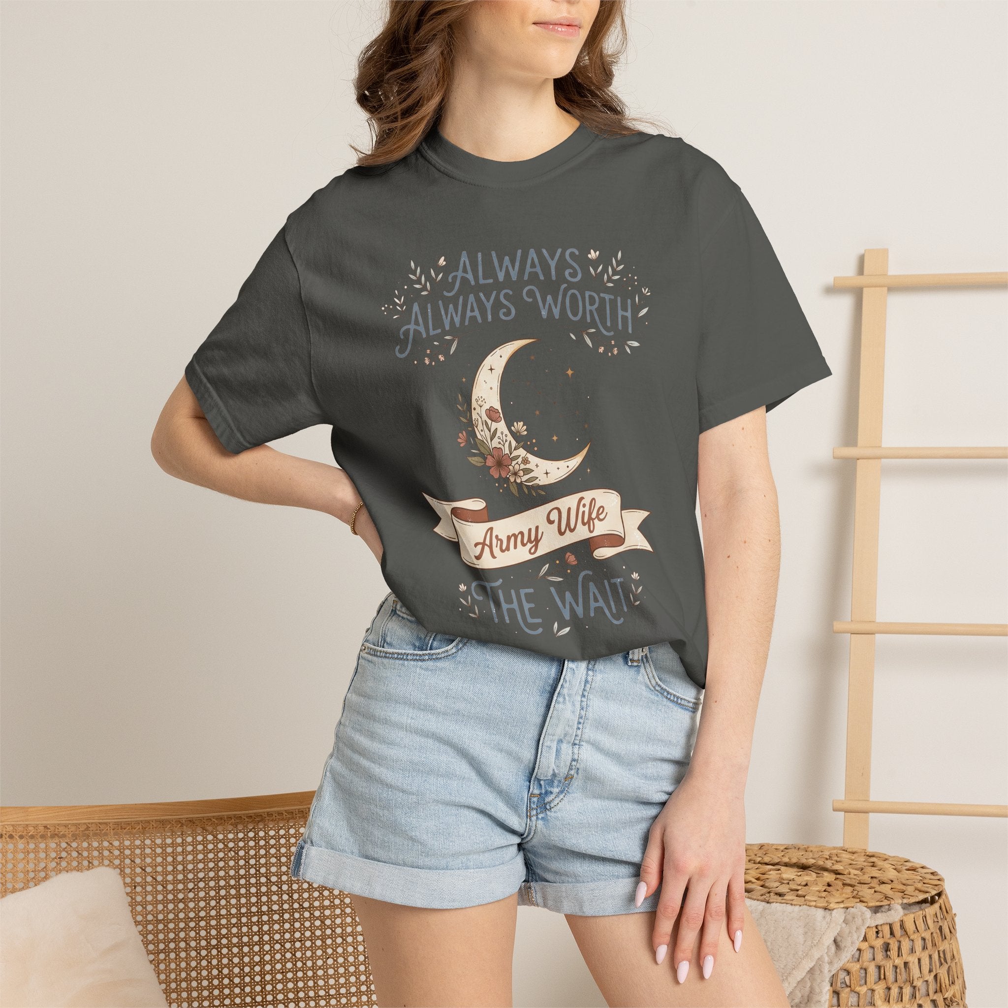 T-shirt in dark gray with moon and “ALWAYS WORTH THE WAIT” graphic, worn by model.