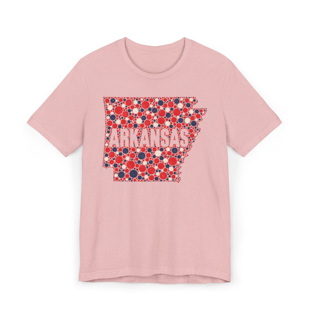 Pink T-shirt with Arkansas outline graphic in red, white, and blue dot pattern