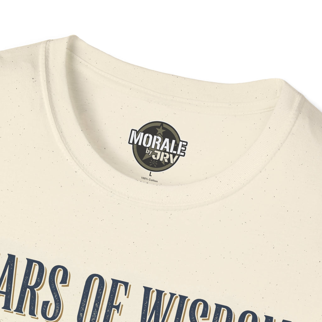 Cream T-shirt neckline with circular brand logo and top of “Years of Wisdom” print