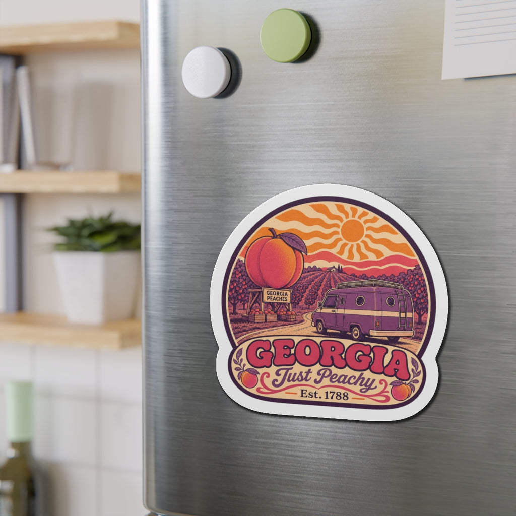 Die-cut Georgia fridge magnet featuring peach fruit, van, and “GEORGIA” lettering