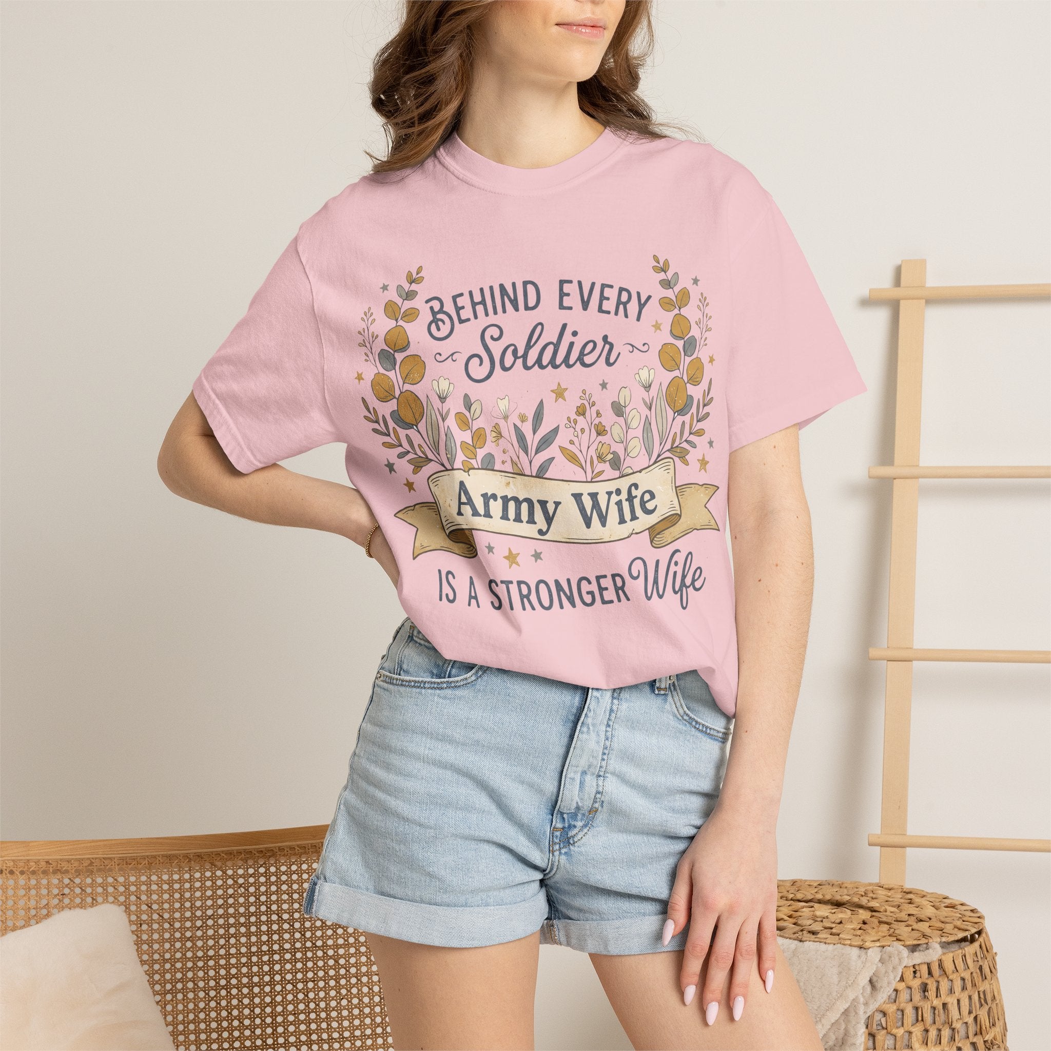 Lavender T-shirt on model, floral “Behind Every Soldier” wreath and “Army Wife”