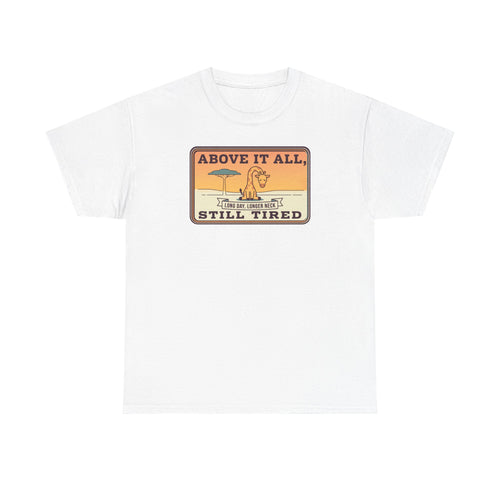 White short-sleeve crewneck tee with chest “Above It All, Still Tired” graphic badge.