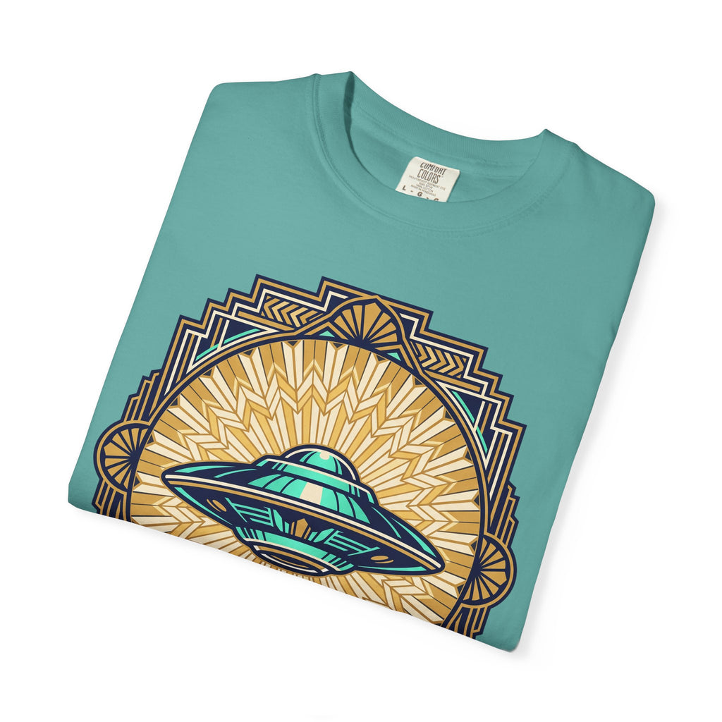 Teal crew-neck T-shirt with a retro flying saucer graphic over a sunburst design.
