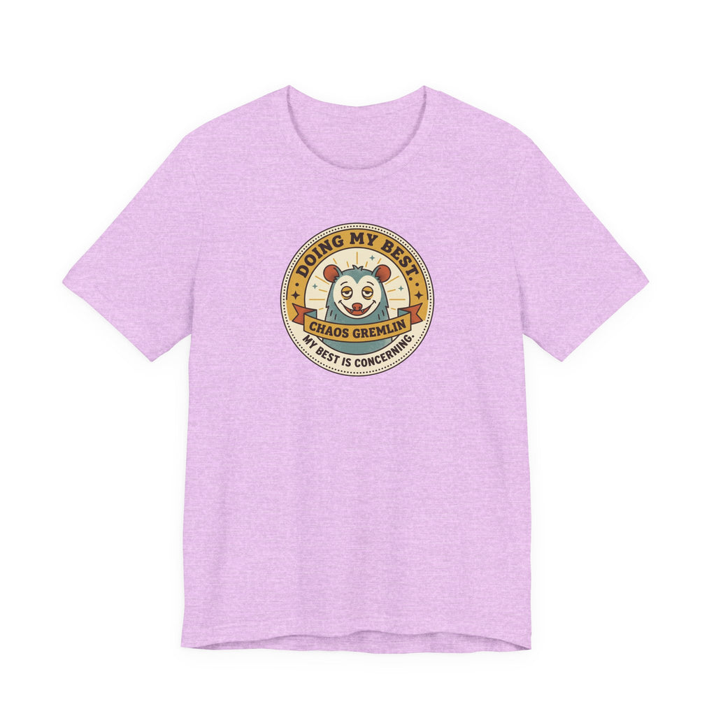 Lavender T-shirt with round gremlin badge graphic on center chest