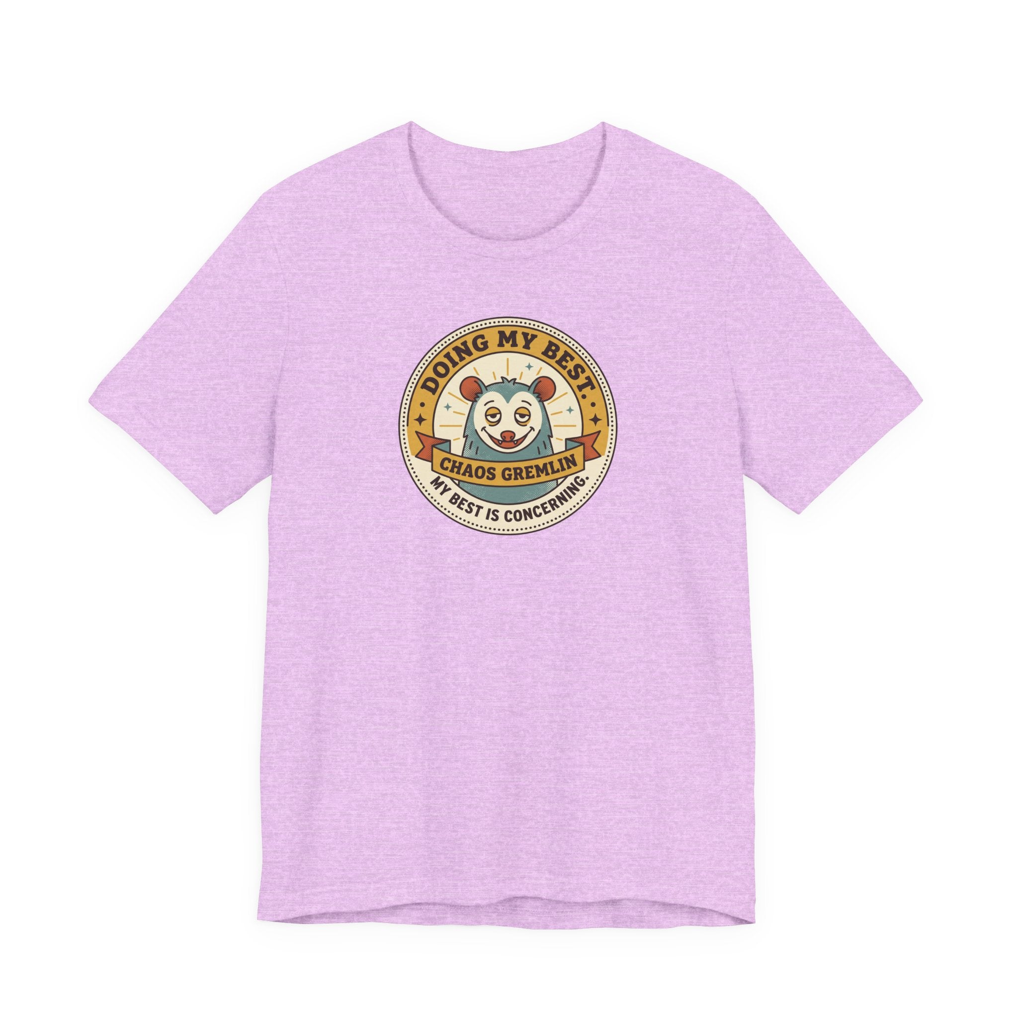 Lavender T-shirt with round gremlin badge graphic on center chest
