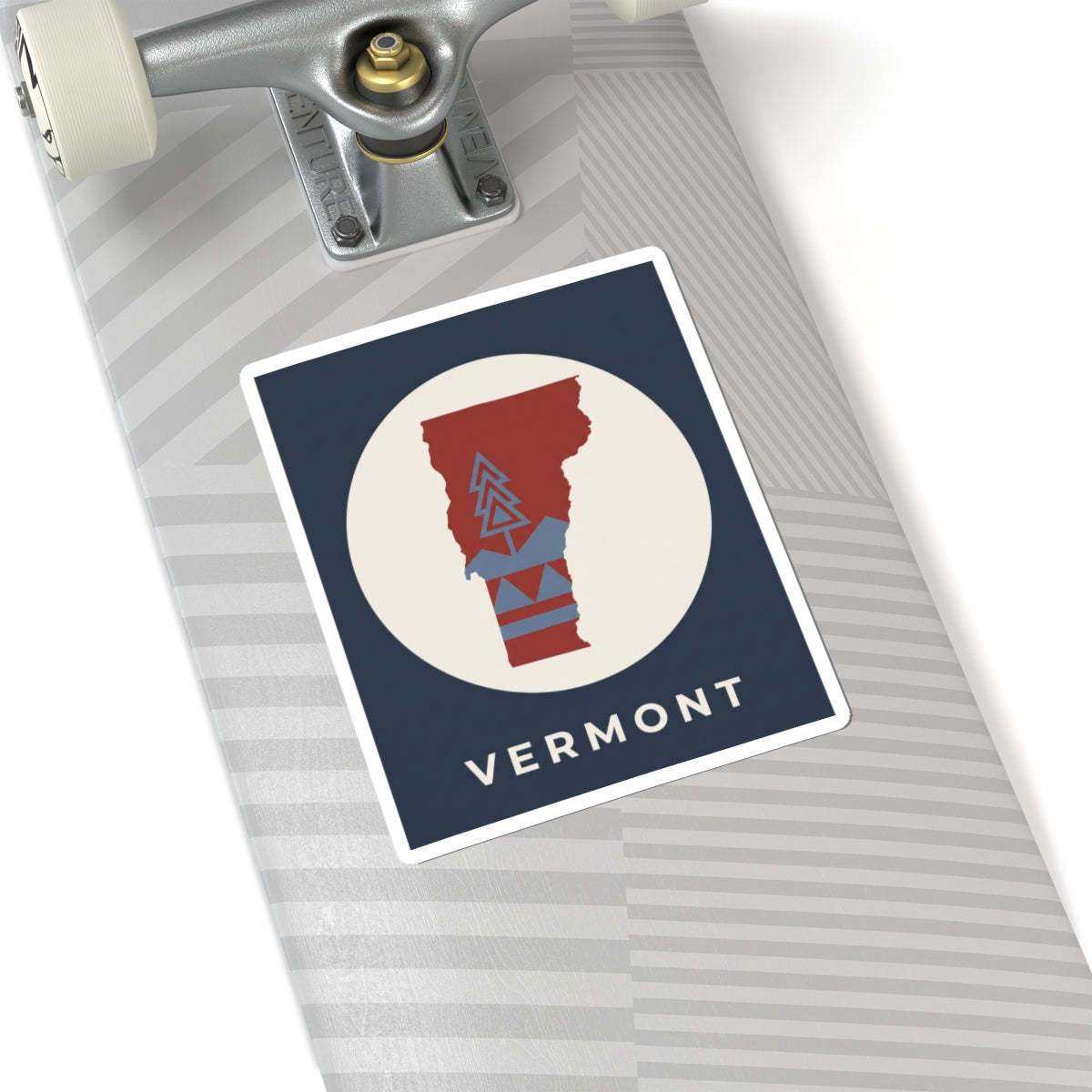 Vermont map kiss-cut sticker, navy rectangle with beige circle, red state graphic and blue mountains