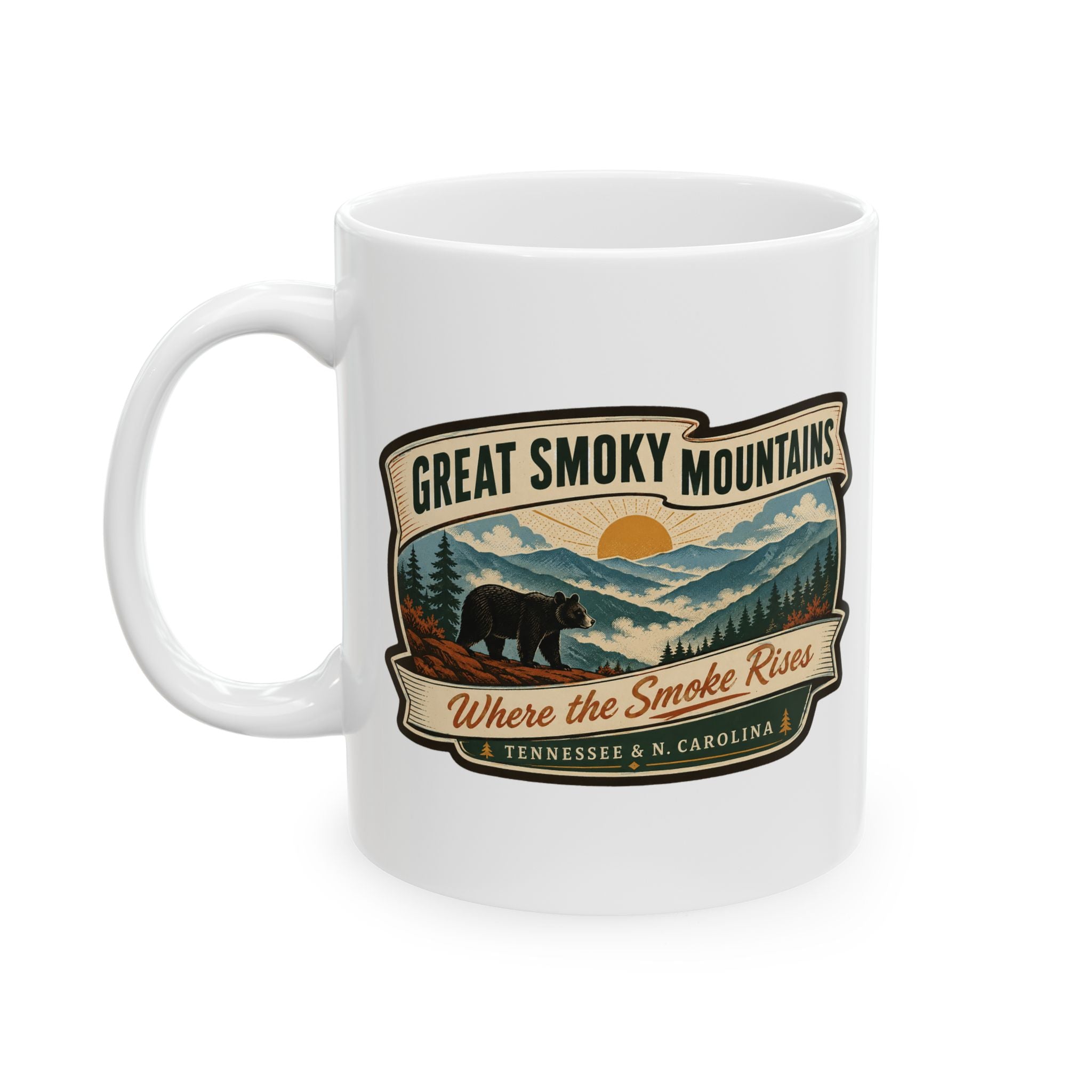 White ceramic travel mug with handle, Great Smoky Mountains badge and “Where the Smoke Rises”