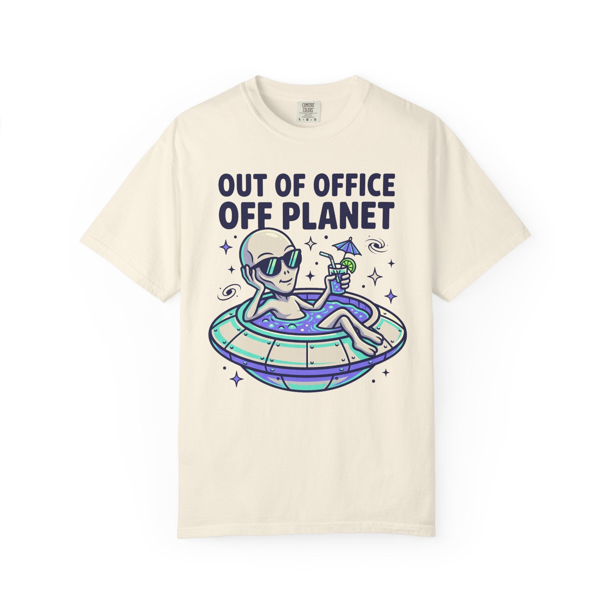 Ivory alien floatie T-shirt with “OUT OF OFFICE OFF PLANET” graphic on front