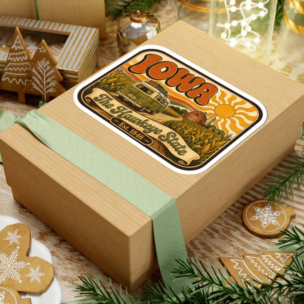 Kiss-cut Iowa retro camper sticker on gift; orange “Iowa” text, cornfield scene, white border