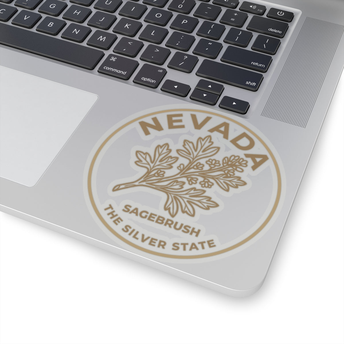 Circular Nevada transparent vinyl sticker showing sagebrush and 'The Silver State' text