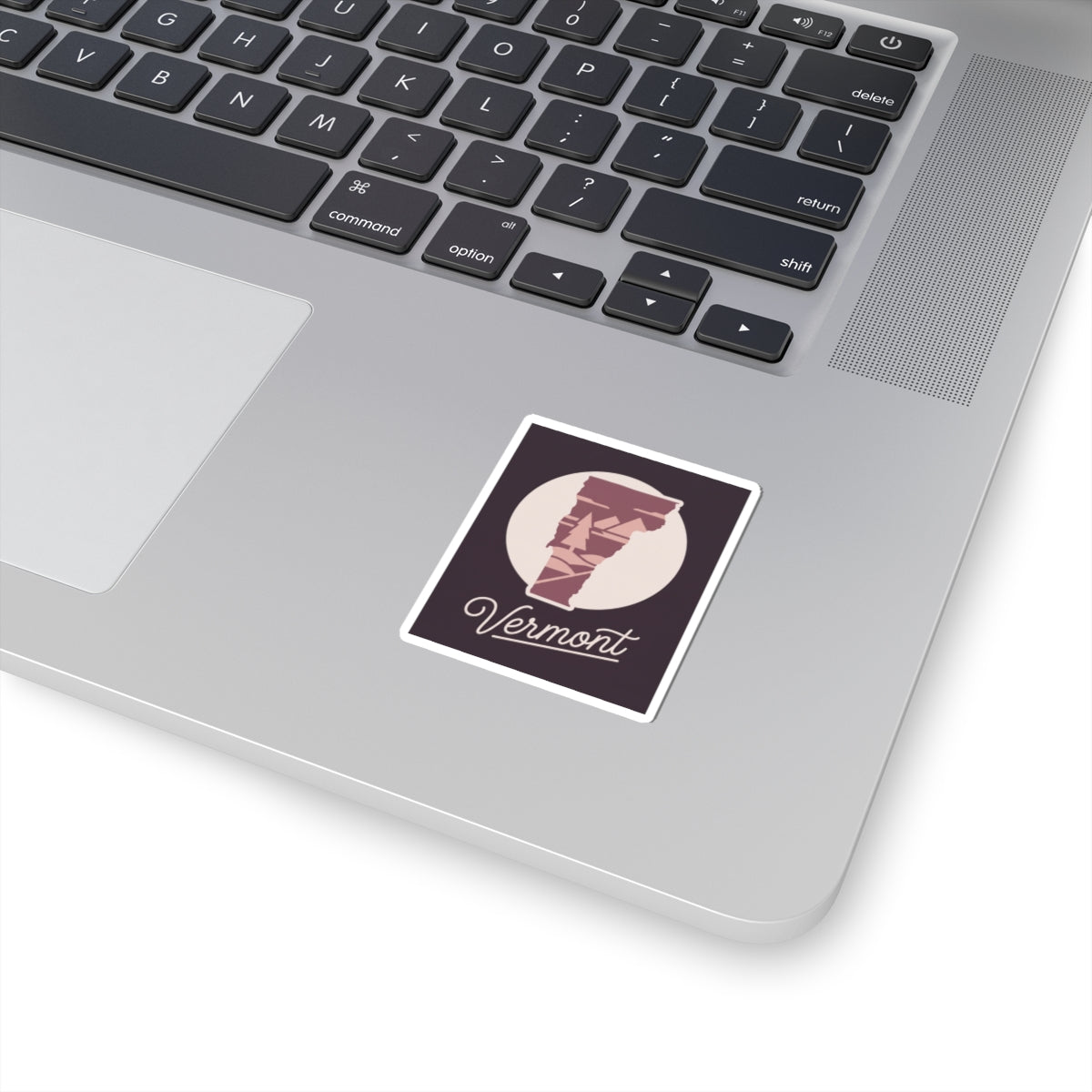 Vermont state silhouette kiss-cut decal, square white border with maroon Vermont text