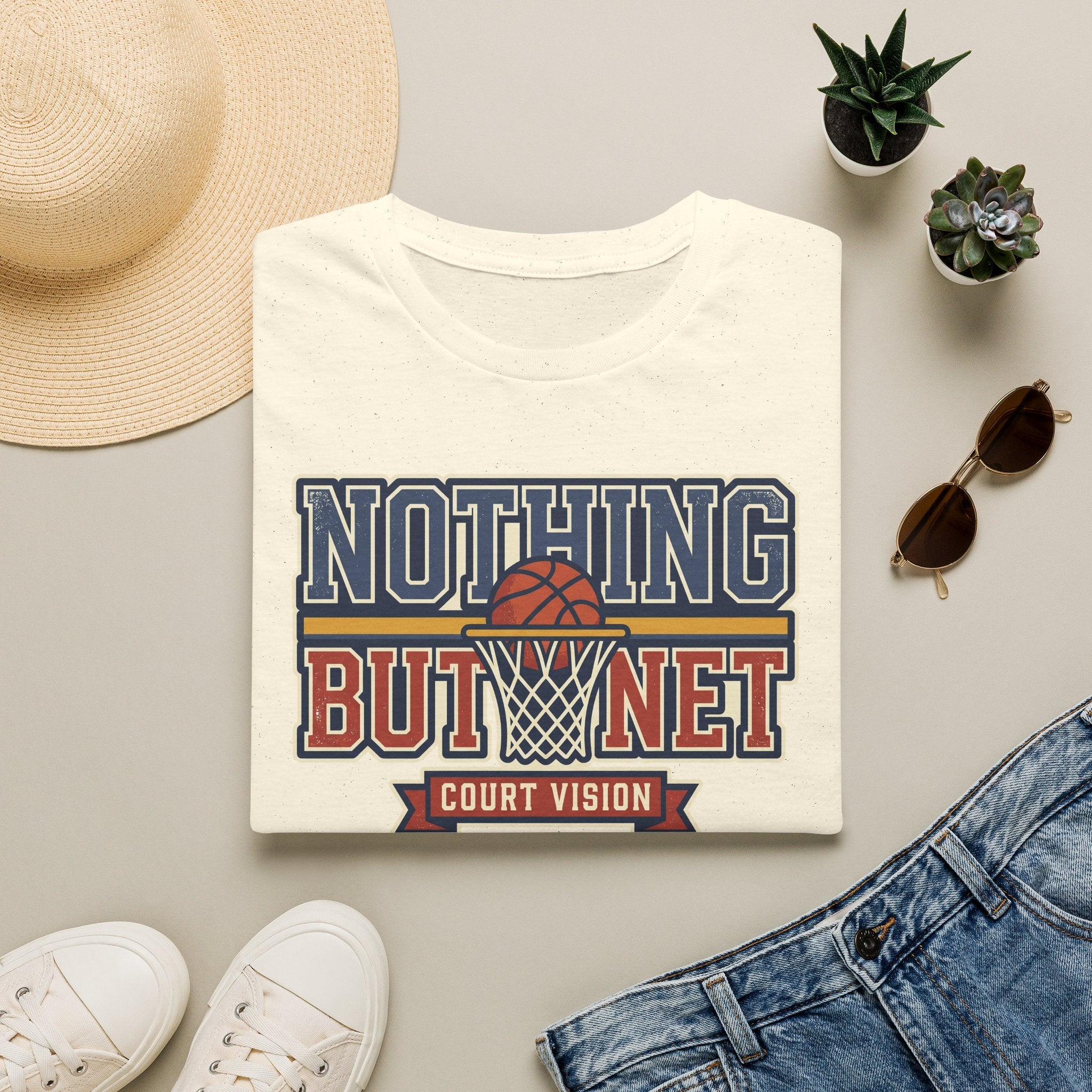 Cream basketball T-shirt with “Nothing But Net” court vision graphic on front.